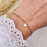 Double bracelet with heart charm