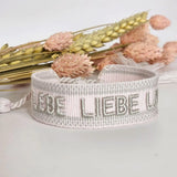 Gewebtes Armband Lebe Liebe Lache