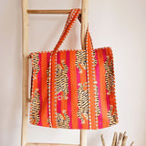 Blockprint schoudertas leopard orange