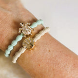 Haarelastiekje schelp bling beige