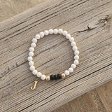 Kralenarmband initiaal