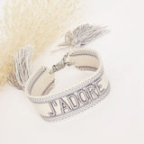 Geweven armband J'adore greige