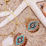 Ibiza oorbellen evil eye
