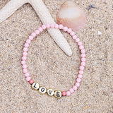 Perlenarmband Love rosa