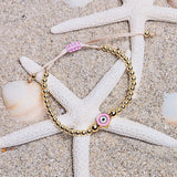 Perlenarmband Evil Eye rund rosa