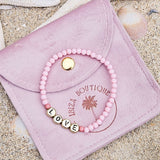 Perlenarmband Love rosa