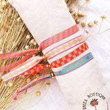 Gestreiftes Bandarmband Rosa/Orange