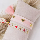 Woven bracelet hearts peach