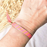 Gestreiftes Bandarmband Rosa/Orange