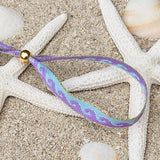 Lint armbandje waves lila/mint