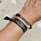 armband-aloha-zwart-met-palmboom-goud