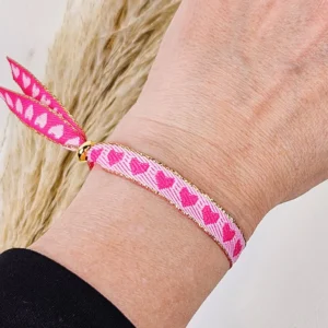 Lint armbandje hartjes roze